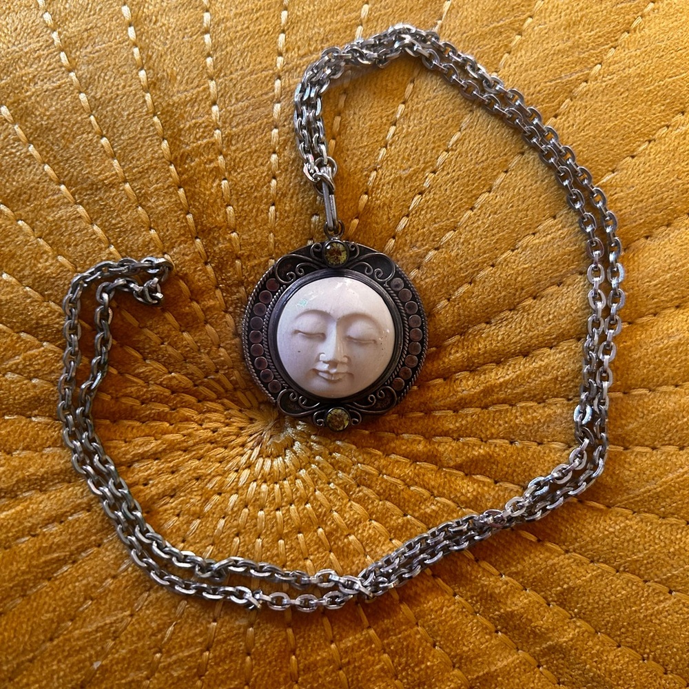 Hand carved moon face peridot pendent